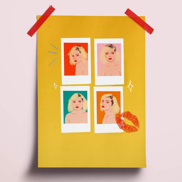 Illustration print of 4 photos of debbie harry of blondie fame. The background to each polaroid is a different colour of red, pink, orange and teal. there is a lipstick kiss mark in the bottom right hand corner.
