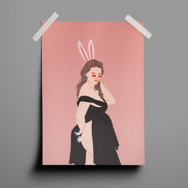 an illustration print of a young voluptuous woman wearing bunny ears and a black dress. she is moving the dress aside to show a bunny tail. the background is a pale pink.