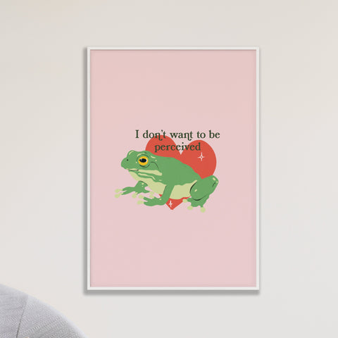 an image of a framed art print  featuring an illustration of a frog in front of a red heart with the text I don't want to be perceived above it.