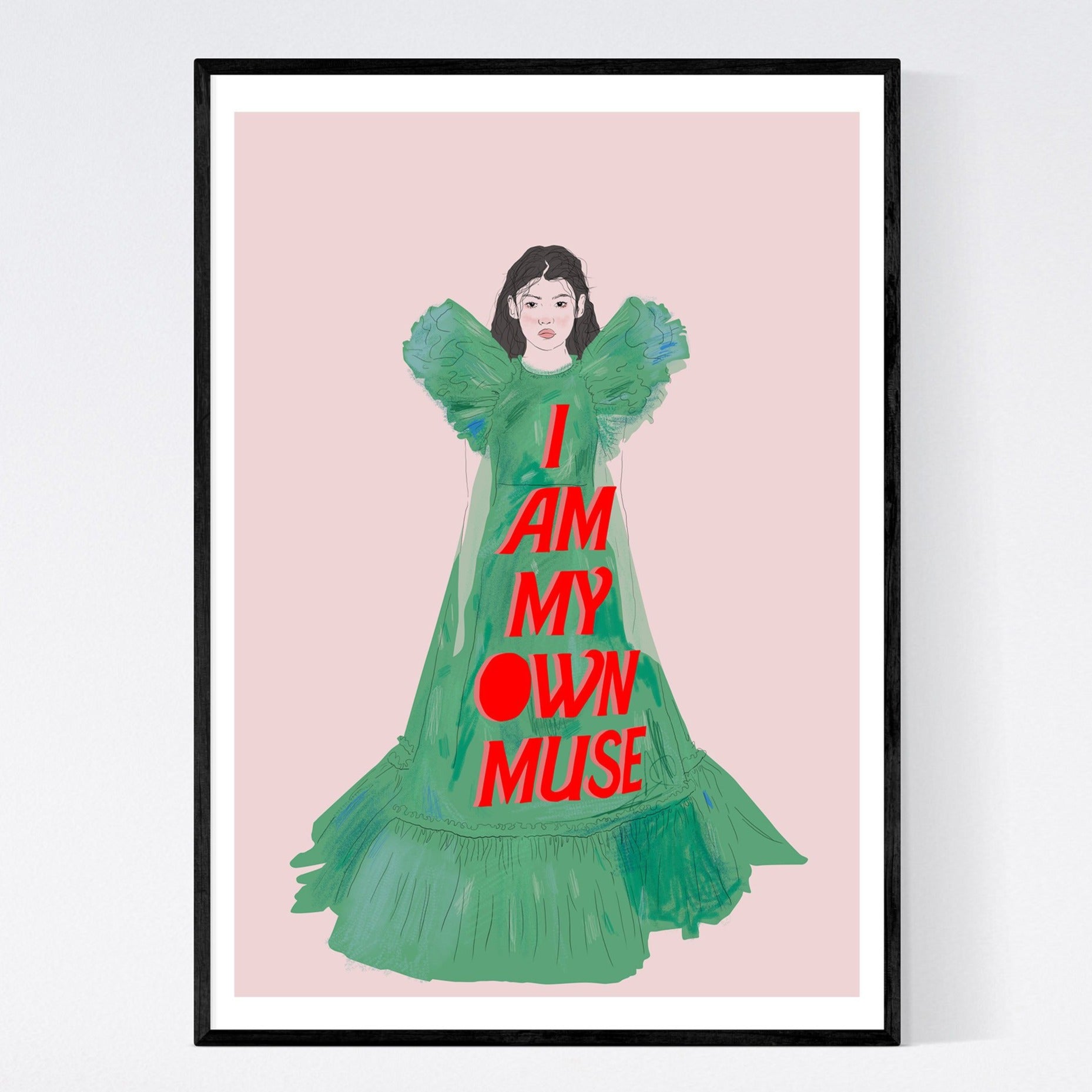 illustration print of a young woman wearing a full length green dress with the words i am my own muse on it. the background is a light dusky pink.