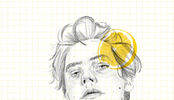 zoomed in look at an illustration print of Cole sprouse hand drawn in biro. behind him is a grid texture in a pale yellow. There is a motif of lemon slices around the portrait.