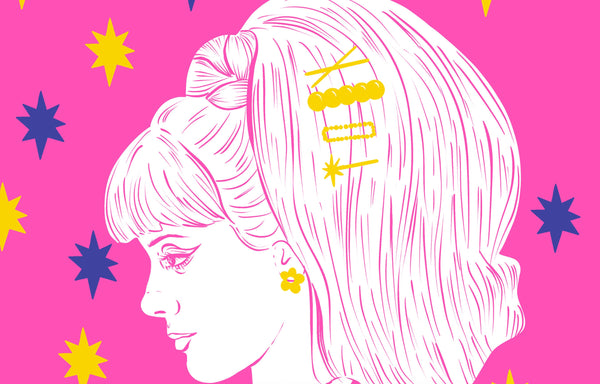 zoomed in on a illustration print of a young woman in profile with a large beehive and several clips in her hair. The background is a vibrant pink and is dotted with stars in blue and yellow.