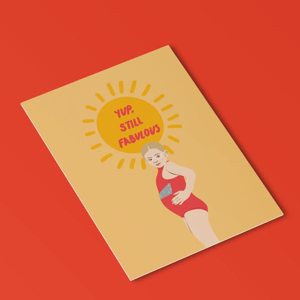 postcard featuring an illustration of olive from little miss sunshine in her pageant swim suit behind her is a sun with the phrase 'yup, still fabulous' written in it. the background is a pale yellow.
