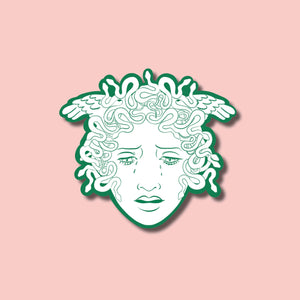 image of a medusa sticker on a pink background