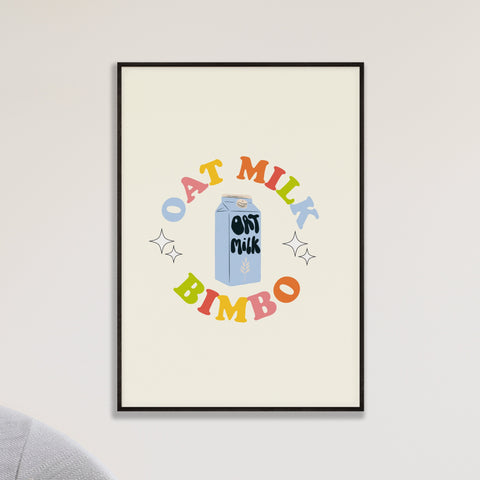 an image of a framed art print, the print is of an illustration of an oat milk carton with the text 'oat milk bimbo' surrounding it in a circle. Each letter is a different rainbow colour and the typeface is vintage inspired. There are sparkles outlined in black on either side of the oat milk carton. The background of the print is cream coloured.