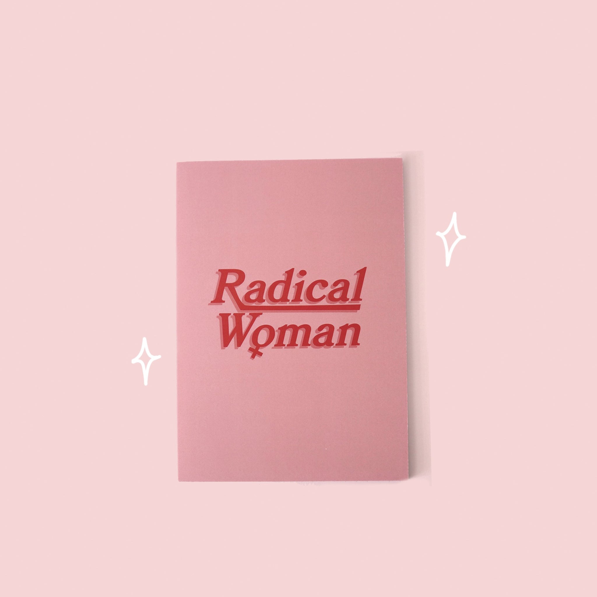 image of a pink whatmabeldid notebook with a slogan saying 'radical woman' in red