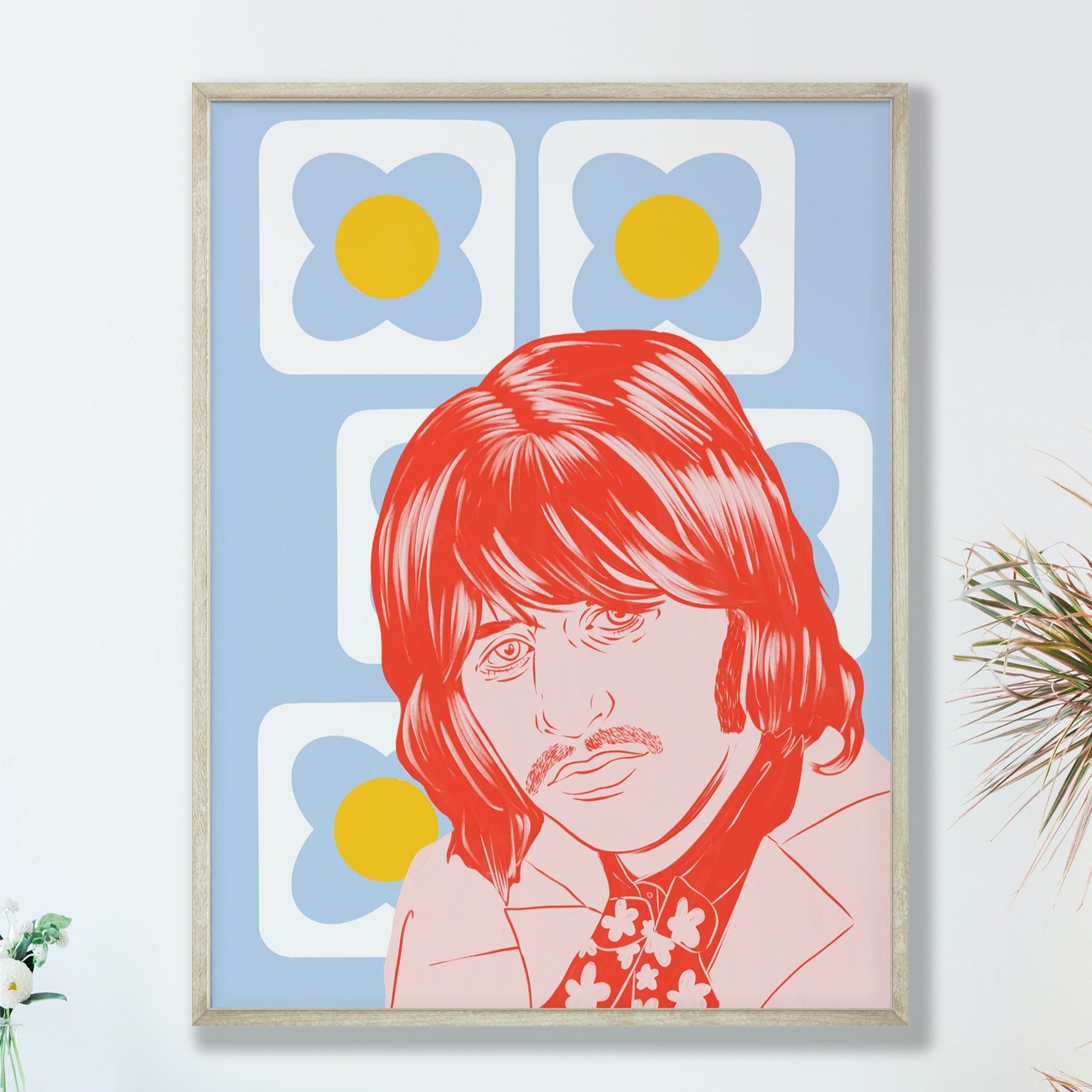 image of ringo starr art print framed on a white wall .